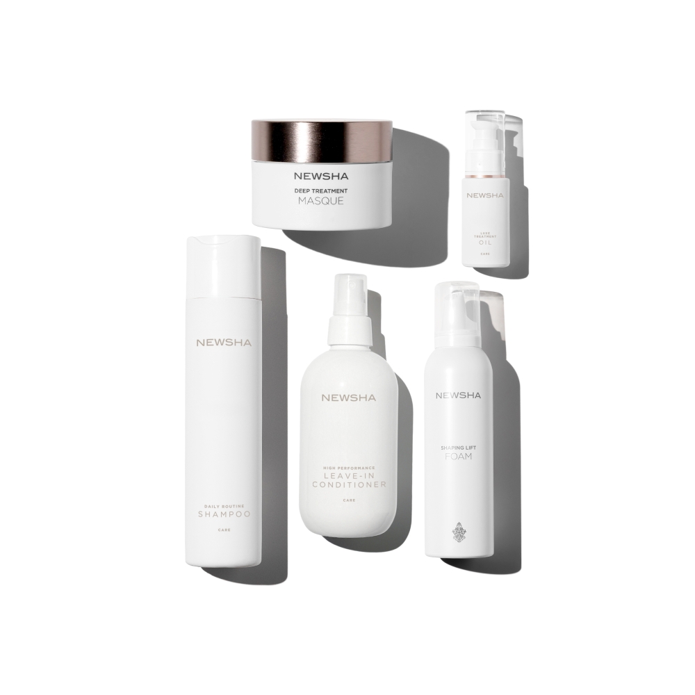 Pflegeset für geschmeidiges und gepflegtes Haar. NEWSHA Deep Treatment Masque, Leave-In Conditioner, Daily Routine Shampoo, Shaping Lift Foam und Luxe Treatment Oil im Überblick für intensive Haarpflege und Styling.