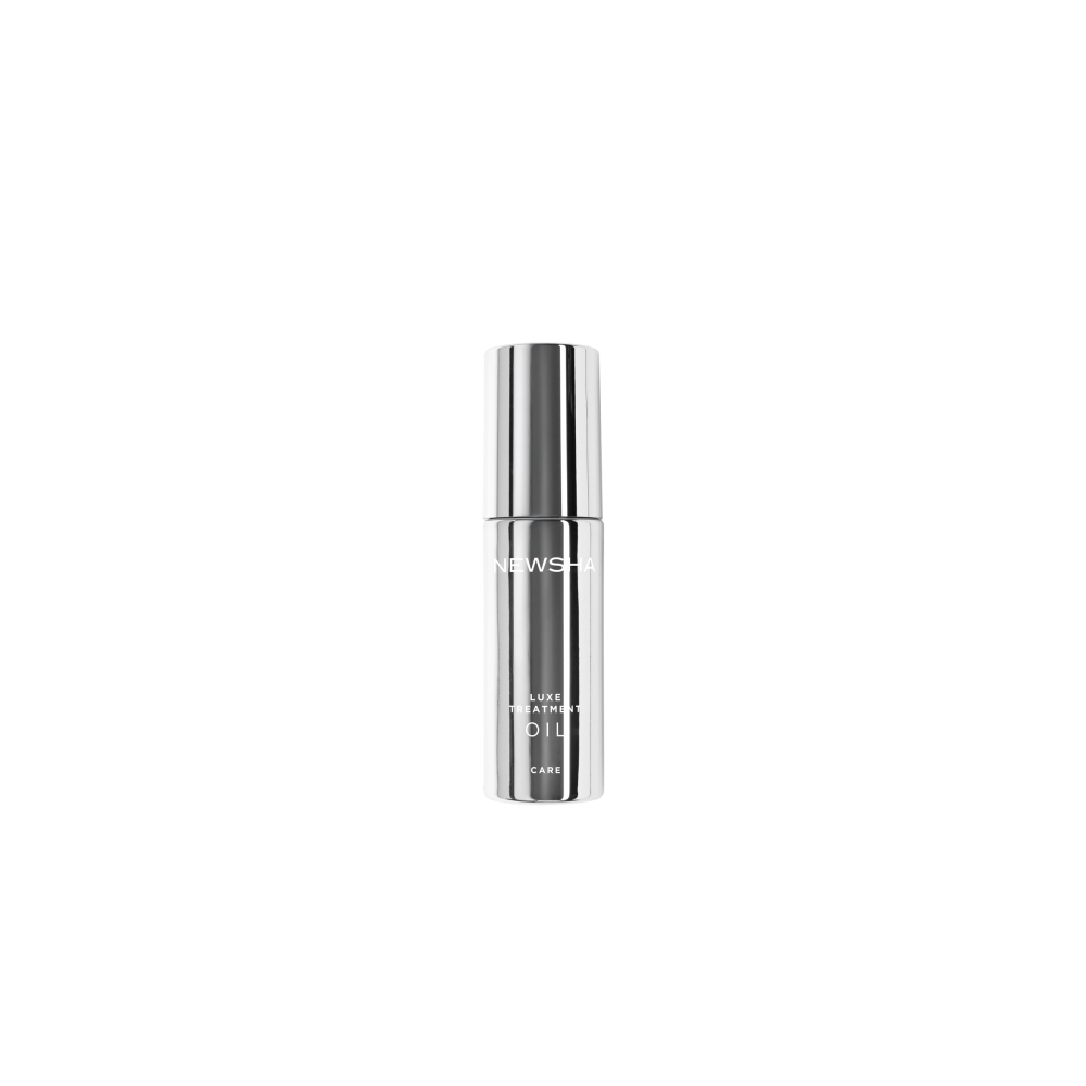 NEWSHA Luxe Treatment Oil in eleganter, weißer Pumpflasche. Luxuriöses Haaröl für intensive Pflege, seidigen Glanz und geschmeidige Spitzen. Ideal für trockenes, strapaziertes Haar.