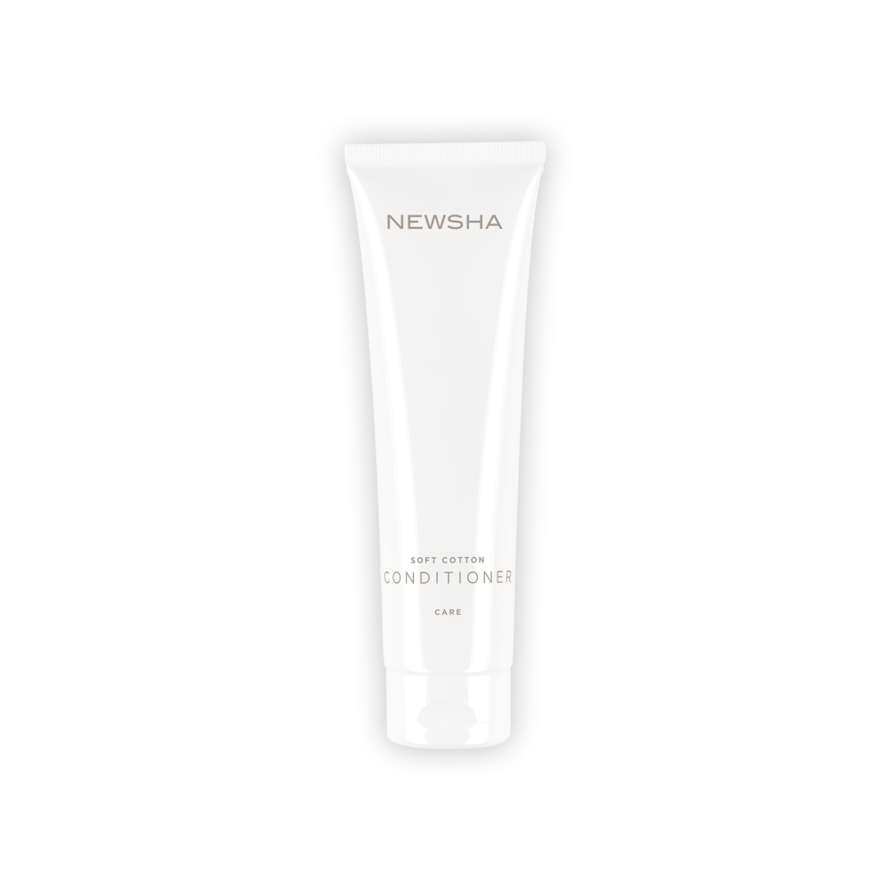 Pflegender Conditioner für geschmeidiges Haar. Soft Cotton Conditioner von NEWSHA spendet Feuchtigkeit, entwirrt sanft und verleiht seidigen Glanz.