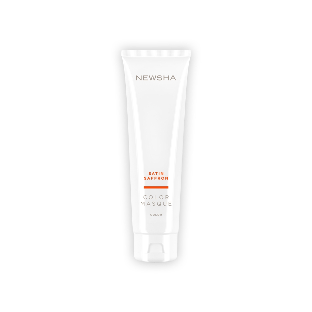 Pflegende Haarveredelung für blondes und kupferfarbenes Haar. Color Masque Satin Saffron von NEWSHA sorgt für ein sattes Kupfer-Finish und intensive Farbauffrischung mit Pflegeeffekt.